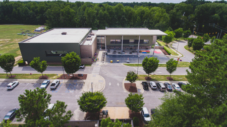 Drone footage of the community center from above the parking lot