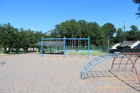 Swing sets and jungle gym set on playground