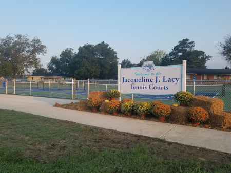 Main sign for the Jacqueline J. Lacy Tennis Courts