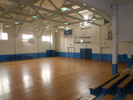 Inside the Kenly gym, viewing the basketball court