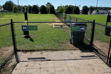 Navigation signs for the small dog and large dog section of the dog park