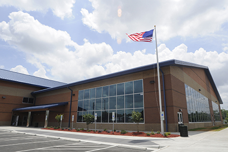 View of the aquatic center from outside in the parking lot