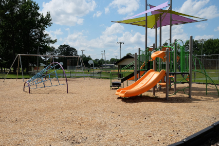 View of the playground and ballfields at Smith Collins Park